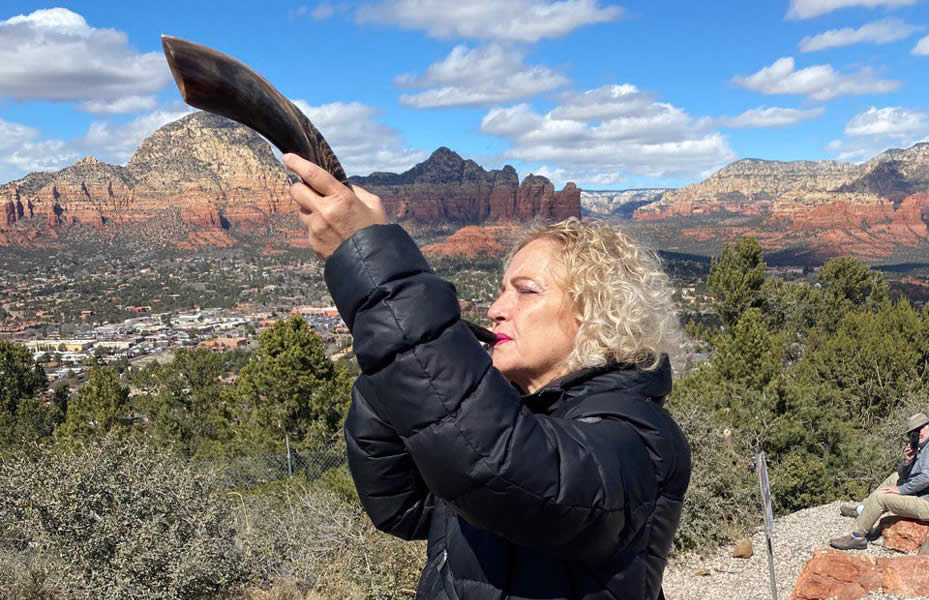 Archbishop Dominiquae Bierman blowing shofar