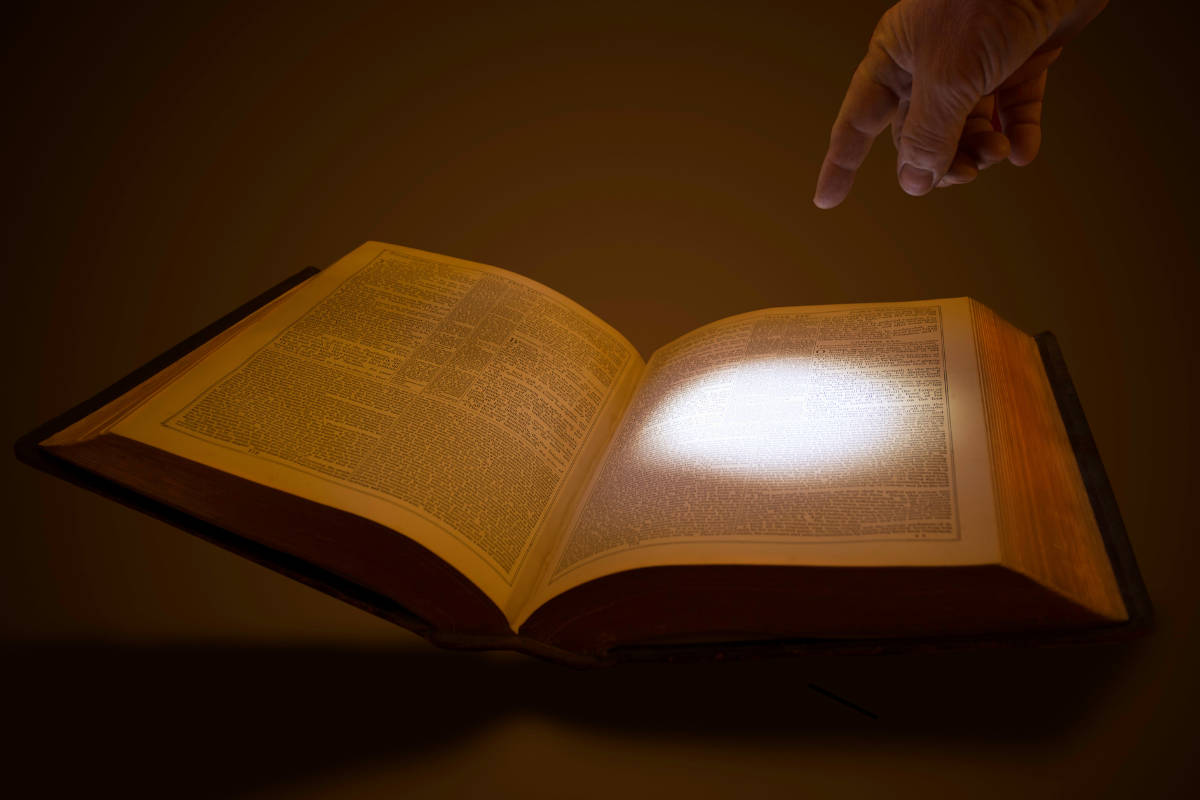 Spot of light on a Bible