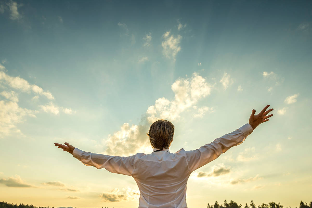 Person raising hands